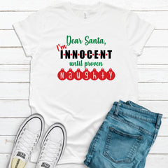 CHRISTMAS Unisex Kid's/Adult's 'Innocent Until Proven Naughty' T-Shirt